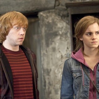 Rupert Grint stars as Ron Weasley and Emma Watson stars as Hermione Granger in Warner Bros. Pictures' Harry Potter and the Deathly Hallows: Part II (2011)