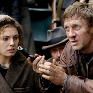 Alexa Davalos stars as Lilka and Daniel Craig stars as Tuvia Bielski in Paramount Vantage's Defiance (2009)