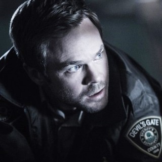 Shawn Ashmore stars as Conrad 'Colt' Salter in IFC Films' Devil's Gate (2018)