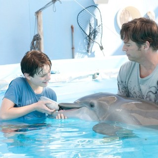 Nathan Gamble stars as Sawyer Nelson and Harry Connick Jr. stars as Dr. Clay Haskett in Warner Bros. Pictures' Dolphin Tale (2011)