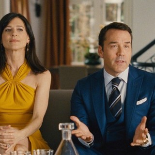 Constance Zimmer stars as Dana Gordon and Jeremy Piven stars as Ari Gold in Warner Bros. Pictures' Entourage (2015)