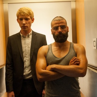 Domhnall Gleeson stars as Caleb and Oscar Isaac stars as Nathan in A24's Ex Machina (2015) Picture 7