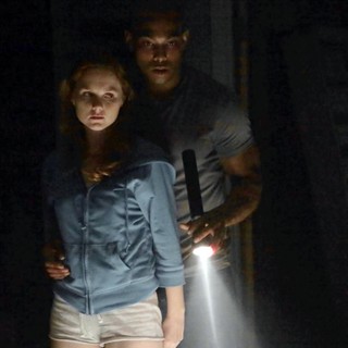 Denise Williamson stars as Elizabeth and Roger Edwards stars as Todd in Lionsgate Films' Exists (2014)