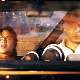 Michelle Rodriguez stars as Letty and Vin Diesel stars as Dominic Toretto in Universal Pictures' Fast and Furious (2009)