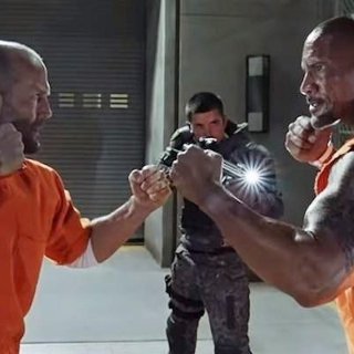 Jason Statham stars as Deckard Shaw and The Rock stars as Hobbs in Universal Pictures' The Fate of the Furious (2017)
