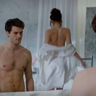 Jamie Dornan stars as Christian Grey in Focus Features' Fifty Shades of Grey (2015)