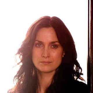 Carrie-Anne Moss stars as Kelly Hanson in Senator International's Fireflies in the Garden (2011)