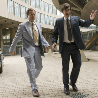 Greg Kinnear stars as Bob Kearns and Dermot Mulroney stars as Gil Privick in Universal Pictures' Flash of Genius (2008).