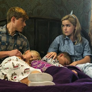 Mason Dye stars as Young Christopher and Kiernan Shipka stars as Young Cathy in Lifetime's Flowers in the Attic (2014)