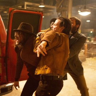 Sharlto Copley, Jack Reynor and Noah Taylor in A24's Free Fire (2017)