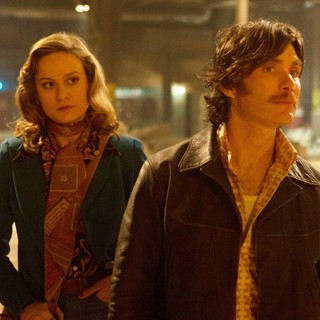 Brie Larson stars as Justine and Cillian Murphy stars as Chris in A24's Free Fire (2017)