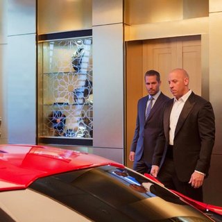 Paul Walker stars as Brian O'Conner and Vin Diesel stars as Dominic Toretto in Universal Pictures' Furious 7 (2015). Photo credit by Scott Garfield.