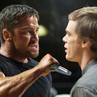 Gerard Butler stars as Kable and Michael C. Hall stars as Ken Castle in Lionsgate Films' Gamer (2009). Photo credit by Saeed Adyani.