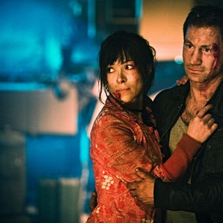 Yasmine Garbi stars as Mariam Wu and Paolo Roberto stars as Paolo Roberto in Music Box Films' The Girl Who Played with Fire (2010)