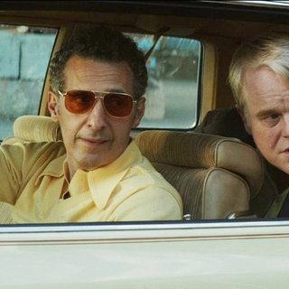 John Turturro and Philip Seymour Hoffman (Mickey Scarpato) in IFC Films' God's Pocket (2014)