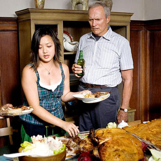 Ahney Her stars as Sue Lor and Clint Eastwood stars as Walt Kowalski in Warner Bros. Pictures' Gran Torino (2008)
