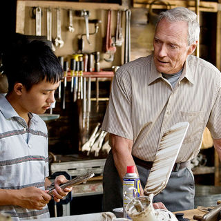 Bee Vang stars as Tao Vang Lor and Clint Eastwood stars as Walt Kowalski in Warner Bros. Pictures' Gran Torino (2008)
