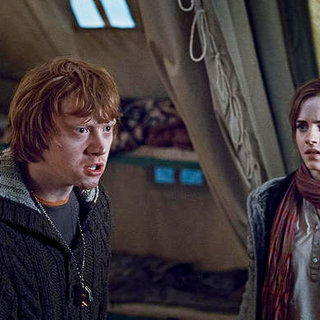 Rupert Grint stars as Ron Weasley and Emma Watson stars as Hermione Granger in Warner Bros. Pictures' Harry Potter and the Deathly Hallows: Part I (2010)