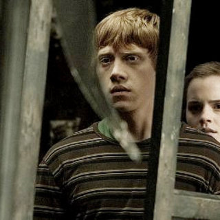 Rupert Grint, Daniel Radcliffe and Emma Watson in Warner Bros. Pictures' Harry Potter and the Deathly Hallows: Part I (2010)