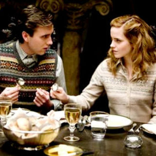 Matthew Lewis stars as Neville Longbottom and Emma Watson stars as Hermione Granger in Warner Bros Pictures' Harry Potter and the Half-Blood Prince (2009)