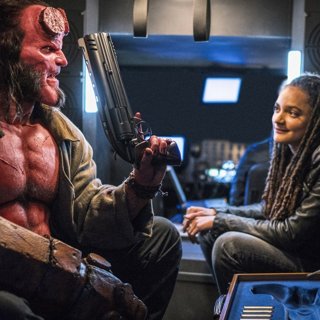 David Harbour stars as Hellboy and Sasha Lane stars as Alice Monaghan in Lionsgate Films' Hellboy (2019)