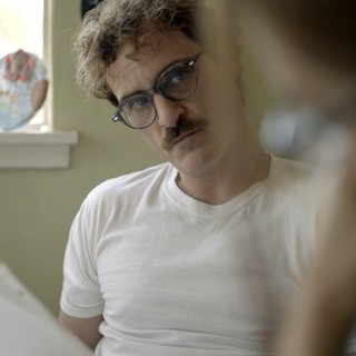 Joaquin Phoenix stars as Theodore in Warner Bros. Pictures' Her (2013)