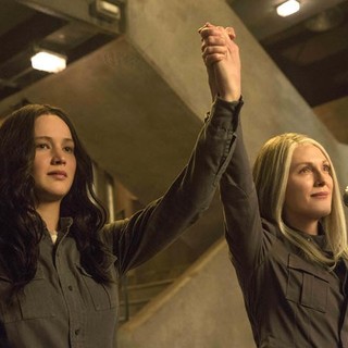 Jennifer Lawrence stars as Katniss Everdeen and Julianne Moore stars as President Alma Coin in Lionsgate Films' The Hunger Games: Mockingjay, Part 1 (2014)