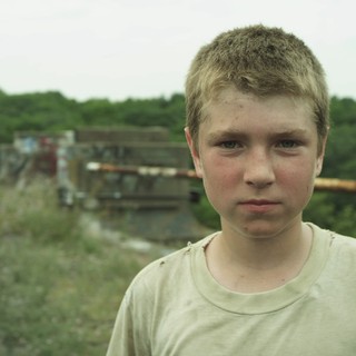 Ryan Jones stars as Tommy in Tribeca Film's Hide Your Smiling Faces (2014)