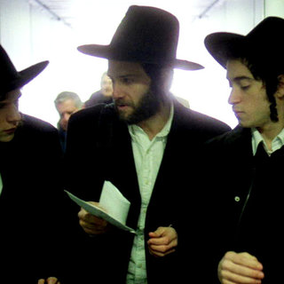 Jesse Eisenberg, Justin Bartha and Jason Fuchs in First Independent Pictures' Holy Rollers (2010)