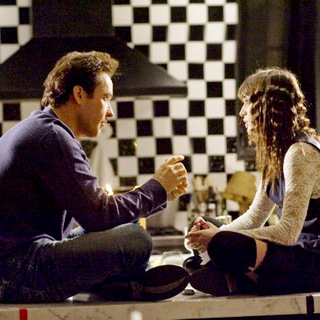 John Cusack stars as Adam and Lizzy Caplan stars as April in MGM's Hot Tub Time Machine (2010)