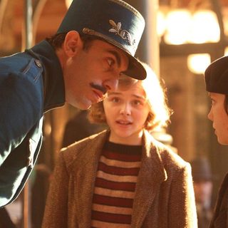 Sacha Baron Cohen, Chloe Moretz and Asa Butterfield in Paramount Pictures' Hugo (2011)