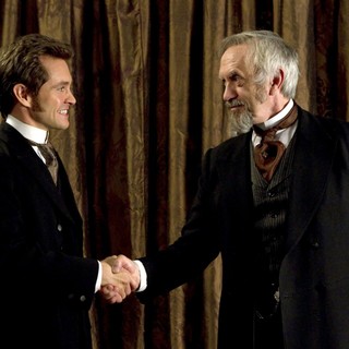 Hugh Dancy stars as Mortimer Granville and Jonathan Pryce stars as Dr. Dalrymple in Sony Pictures Classics' Hysteria (2012). Photo credit by Ricardo Vaz Palma.