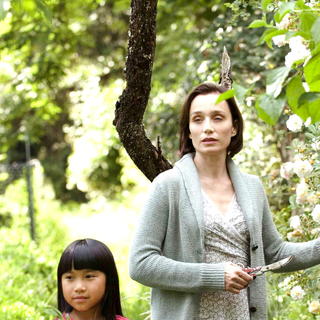Lise Segur stars as P'tit Lys and Kristin Scott Thomas stars as Juliette Fontaine in Sony Pictures Classics' I've Loved You So Long (2008). Photo credit by Thierry Valletoux.