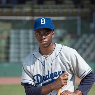Chadwick Boseman stars as Jackie Robinson in Warner Bros. Pictures' 42 (2013)