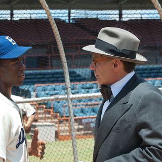 Chadwick Boseman stars as Jackie Robinson and Harrison Ford stars as Branch Rickey in Warner Bros. Pictures' 42 (2013)
