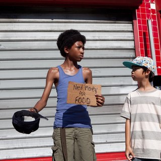 Skylan Brooks stars as Mister and Ethan Dizon stars as Pete in Codeblack Films' The Inevitable Defeat of Mister and Pete (2013)