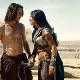 Taylor Kitsch stars as John Carter and Lynn Collins stars as Dejah Thoris in Walt Disney Pictures' John Carter (2012)