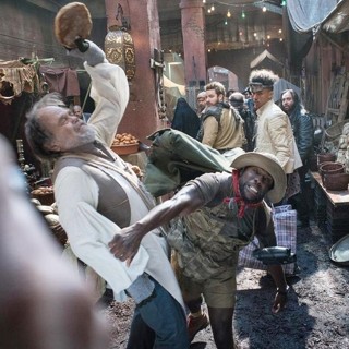 William Tokarsky stars as Bread Vendor and Kevin Hart stars as Fridge in Columbia Pictures' Jumanji: Welcome to the Jungle (2017)