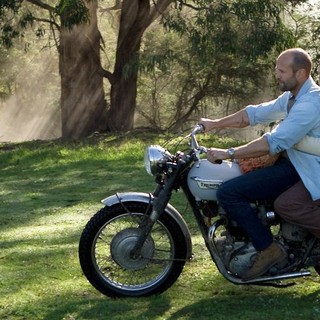 Jason Statham stars as Danny Bryce and Yvonne Strahovski stars as Anne in Open Road Films' Killer Elite (2011)