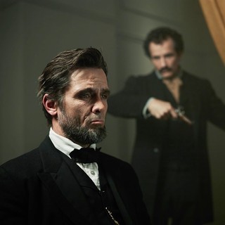 Billy Campbell stars as Abraham Lincoln and Jesse Johnson stars as John Wilkes Booth in National Geographic's Killing Lincoln (2013)