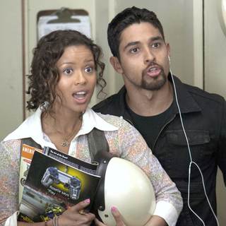 Gugu Mbatha-Raw stars as Talia and Wilmer Valderrama stars as Dell Gordo in Universal Pictures' Larry Crowne (2011)