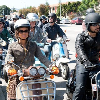 Gugu Mbatha-Raw stars as Talia and Wilmer Valderrama stars as Dell Gordo in Universal Pictures' Larry Crowne (2011)