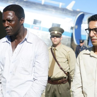 Idris Elba stars as Nelson Mandela and Riaad Moosa stars as Ahmed Kathrada in The Weinstein Company's' Mandela: Long Walk to Freedom (2013)