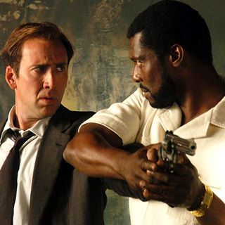 Nicolas Cage and Eamonn Walker in Lions Gate Films' Lord of War (2005)