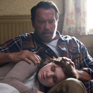 Abigail Breslin stars as Maggie and Arnold Schwarzenegger stars as Wade in Lionsgate Films' Maggie (2015)