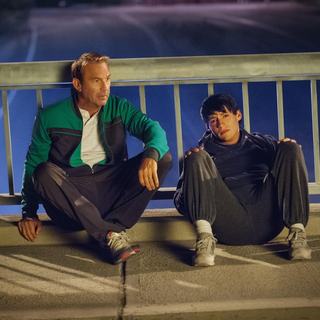 Kevin Costner stars as Jim White and Carlos Pratts stars as Thomas in Walt Disney Pictures' McFarland, USA (2015)
