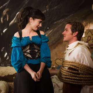 Lily Collins stars as Snow White and Armie Hammer stars as Prince Andrew Alcott in Relativity Media's Mirror Mirror (2012). Photo credit by Jan Thijs.