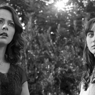 Amy Acker stars as Beatrice and Ashley Johnson stars as Margaret in Lionsgate Films' Much Ado About Nothing (2013)