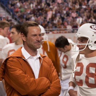 Aaron Eckhart stars as Darrell Royal and Finn Wittrock stars as Freddie Steinmark in Clarius Entertainment's My All American (2015)