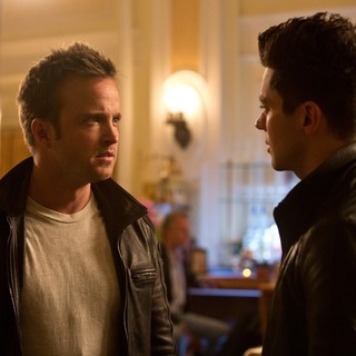 Aaron Paul stars as Tobey Marshall and Dominic Cooper stars as Dino Brewster in Walt Disney Pictures' Need for Speed (2014). Photo credit by Melinda Sue Gordon.